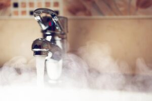Hot Water Problems: Should You Call A Plumber Or An Electrician?